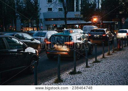 Lisbon, April 25, 2018: Many Cars At The Crossroads In The Evening. Traffic In The City