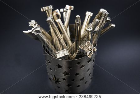 Carving Leather Craft Stamps Set Tool On Black Background
