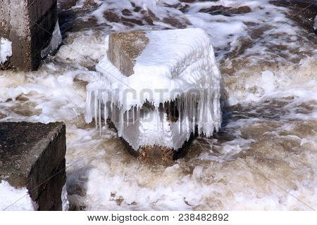 Strange Triangle-shaped Concrete Structure In Boiling River Water In Spring In Spring