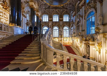 Saint Petersburg, Russia - March 16, 2018: Visitors On Jordan Staircase Of Hermitage Museum. The Sta
