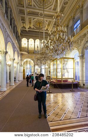 Saint Petersburg, Russia - March 16, 2018: Tourists In Peacock Clock Hall In Hermitage Museum. The S