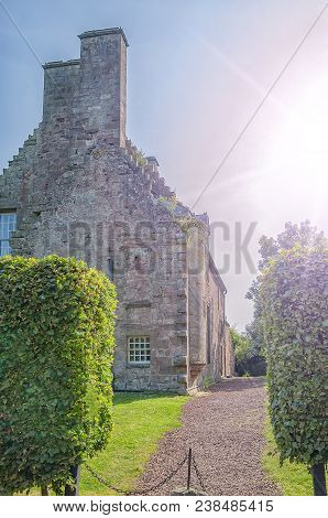 Heavily Fortified Castle Ruins Located On A Dramatic Promontory Overlooking The River Esk.