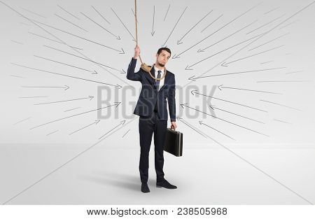 Hopeless young businessman trying to suicide with question signs concept