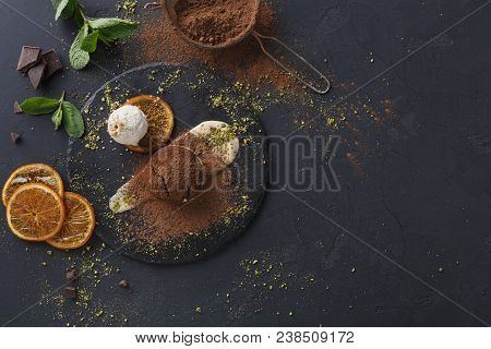 Classic French Dessert. Chocolate Fondant Lava Cake With Custard And Vanilla Ice Cream On Slate, Cit