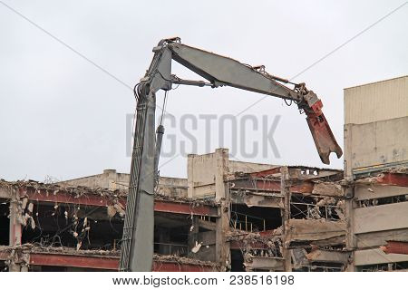 The Grab Of A Pulveriser Demolishing A Building.