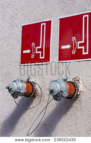 Fire Hydrant,fire Department Connection, Two Standpips On Cement Wall, Explanatory Plate With Symbol