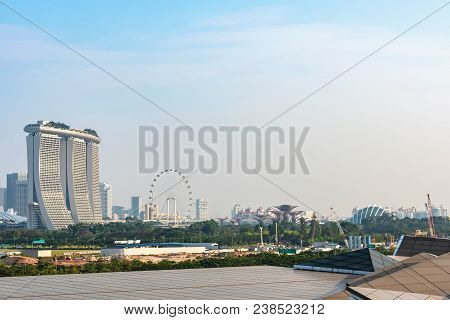 Panoramic View Of Singapore City With Its Buildings Parks And Attractions From The Harbor