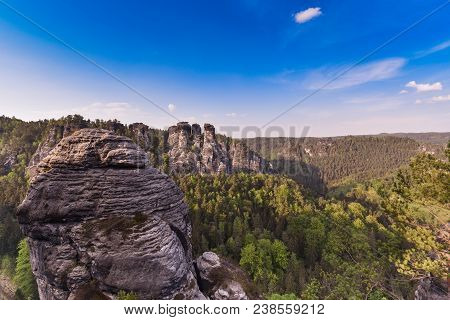Bastei Rocks In Swiss Saxony, Around The Ruins Of Neurathen Castle. Germany In Summer