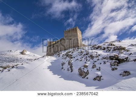 Castle Of The Village Of Argueso In The Province Of Cantabria Spain On A Snowy Winter Day
