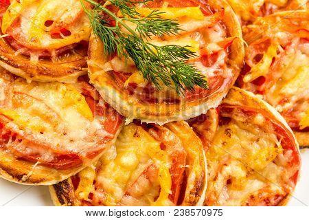 Mix Of Mini Pizzas On A Stone Try On White Background