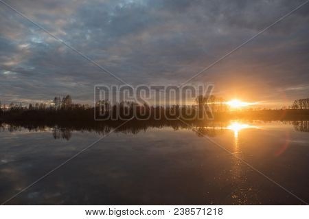 Sunset On The Lake On A Warm Spring Evening