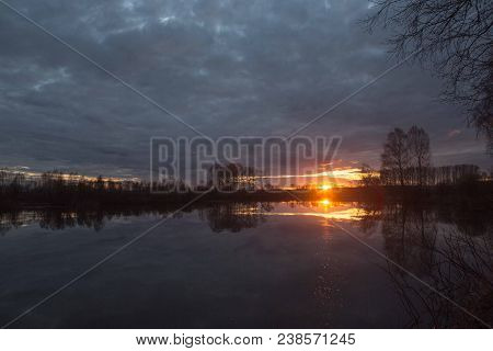 Sunset On The Lake On A Warm Spring Evening