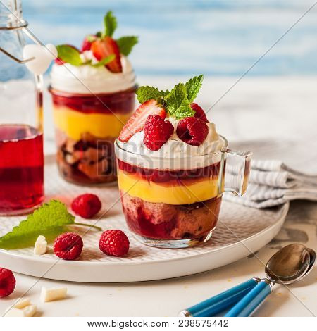 Fruit Cake, Jelly, Custard, Berry And White Cocolate Whipped Cream Individual Trifles, Square