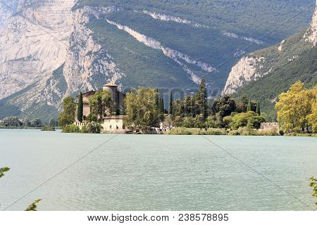 Castle Castel Toblino At Lake Lago Di Toblino And Mountain Panorama In Italy