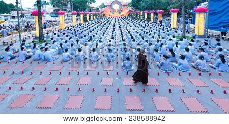 Ho Chi Minh City, Vietnam - January 3, 2018: Buddhist Party Came Prepared With Hundreds Candles Line