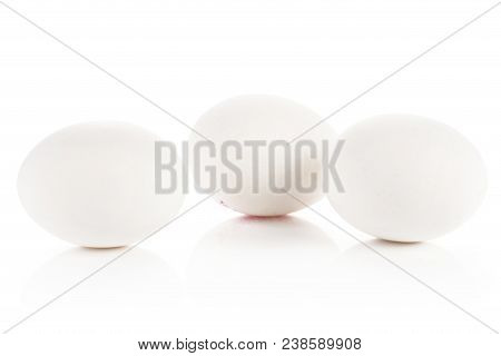 Three White Chicken Eggs Group Isolated On White Background