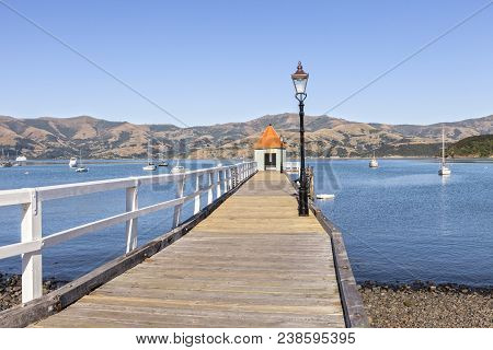 Jetty On Akaroa Harbour, New Zealand