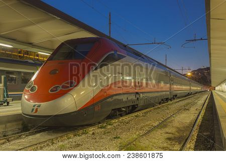 Trieste, Italy - April 27, 2018: Modern High-speed Passenger Train Stand On Main Railways Station In