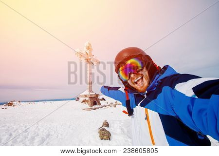 Selfie Guy Sportsman Goes On Normal Skiing On Ski Slope With Action Camera. Sheregesh Background Cro