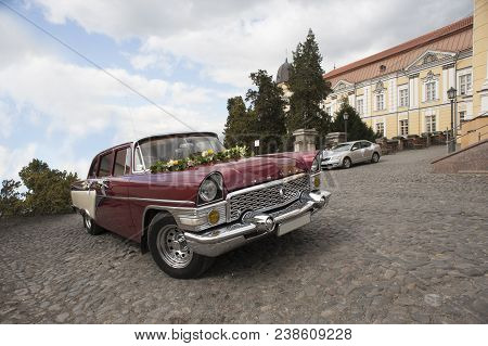 Uzhgorod, Ukraine - 18 April 2015: Old, Washed, Polished Good Looking Retrocar Standing On The Stree