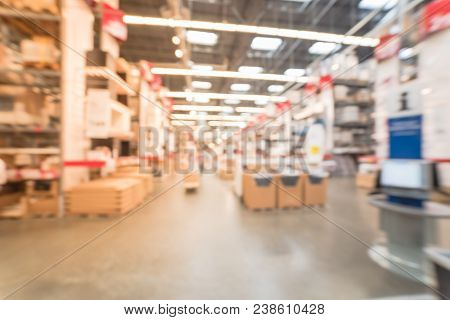 Blurred Large Furniture Warehouse Customer Shopping In America