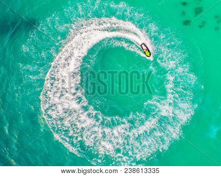 People Are Playing Jet Ski At Sea During The Holidays. Aerial View And Top View.