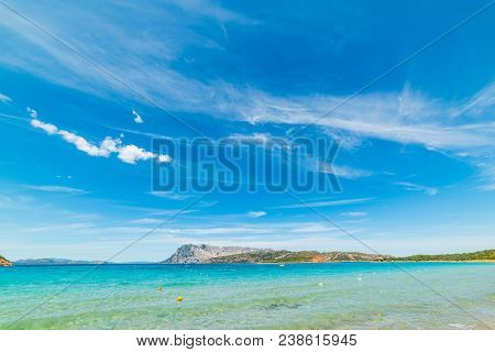Blue Sky Over Capo Coda Cavallo Coastline, Costa Smeralda. Sardinia, Italy