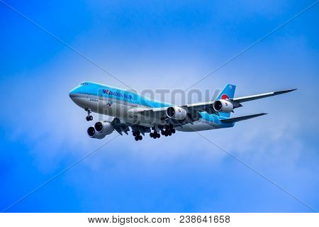 SEOUL, SOUTH KOREA - APRIL 8, 2018: A Korean Air Boeing 747 approaching the landing strip at Incheon Airport - the International airport for Seoul, South Korea.