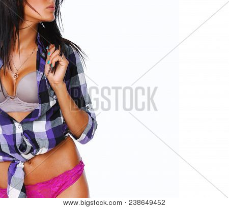 Portrait Of Sexy Brunet Posing In Studio
