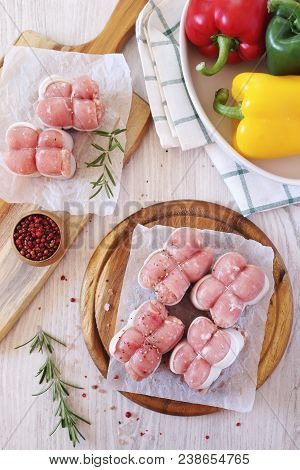 French Cuisine: Raw Meat Paupiettes And Two Bell Peppers, Top View