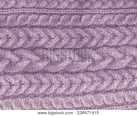 Knitted Backgroung. Knitted Purple Lavender Texture. Knitting Pattern Of Wool. Cable Element