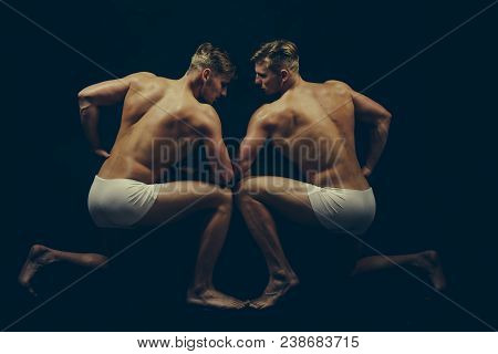 Sport Workout For Bodybuilder. Fitness Dieting And Flexibility In Acrobatics. Twins Men With Muscula