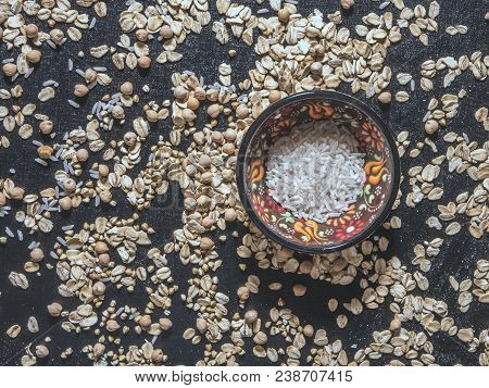 Healthy Diet Raw Cereals On The Black Table Oatmeal