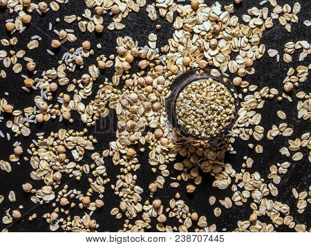 Healthy Diet Raw Cereals On The Black Table Oatmeal
