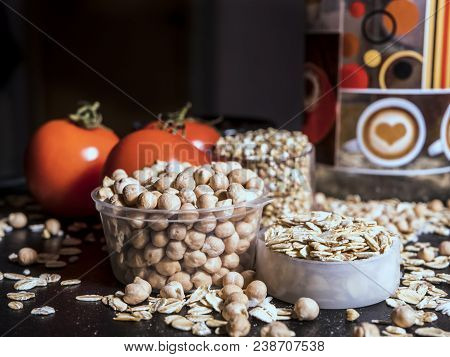 Healthy Diet Raw Cereals On The Black Table Oatmeal