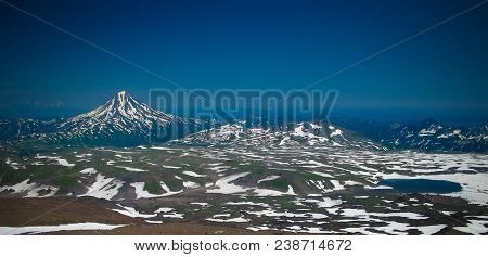 View To Viluchinsky Volcano From The Caldera Of Mutnovsky At Kamchatka Peninsula, Russia