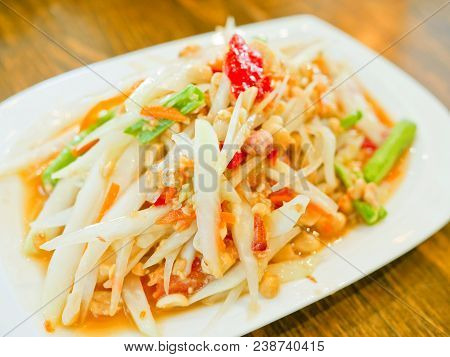 Thai Green Papaya Salad (som Tam Or Som Tum) On Wooden Table. Thai Food.