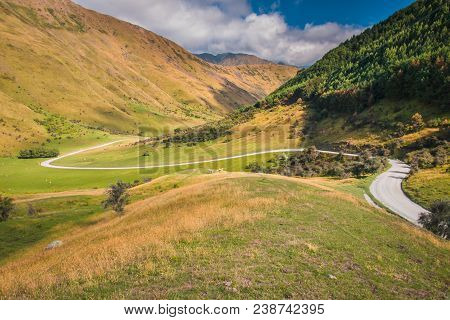 Perfect Winding Road In New Zealand Countryside, Near Queenstown, Otago