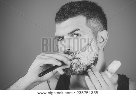 Fashion And Beauty, Innovation. Barber And Hairdresser. Serious Hipster In Barbershop, New Technolog