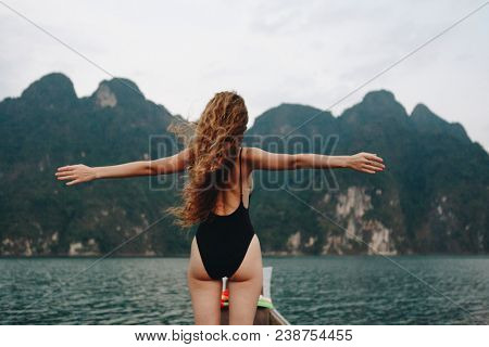 Beautiful woman posing at sunset