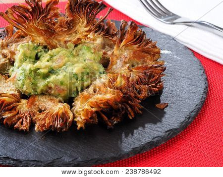 Fried Sliced Artichokes	 - Alcachofas Fritas

Artichoke Slices Deep Fried In Olive Oil. Tasty Vegan 