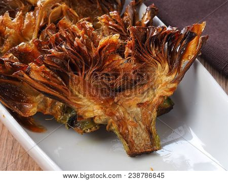 Fried Sliced Artichokes	 - Alcachofas Fritas

Artichoke Slices Deep Fried In Olive Oil. Tasty Vegan 