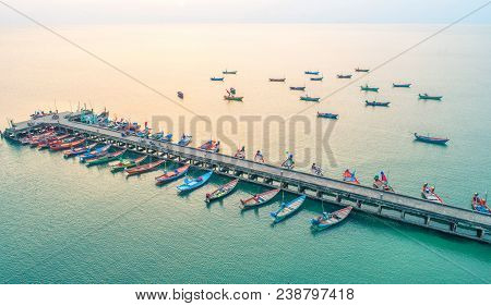 Fishing Boat Floating In The Sea. The Beautiful Bright Blue Water In A Clear Day.aerial View.top Vie