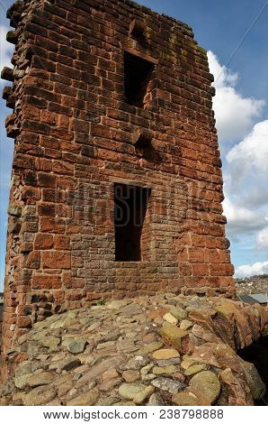A View Of The Ruins Of The Medieval Red Sandstone Castle In Penrith, Cumbria.
