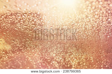 Droplets Of Rain On Car Wind Shield Reflection With Glow Sunlight In Morning Rainy Day