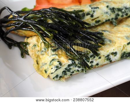 Codium - Velvet Horn - Spongeweed Cooked In Omelette.

Edible Green Seaweed In The Family Codiaceae.