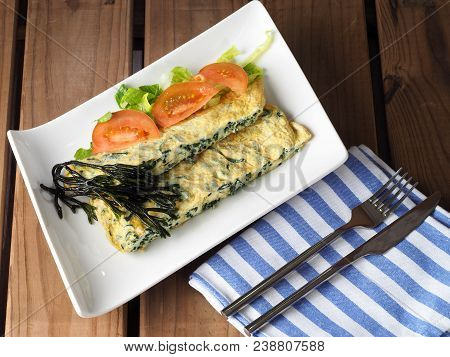 Codium - Velvet Horn - Spongeweed Cooked In Omelette.

Edible Green Seaweed In The Family Codiaceae.
