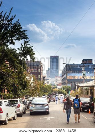 Johannesburg, South Africa, April 29-2018: People Walking Down The Street In Fashionable Inner City 