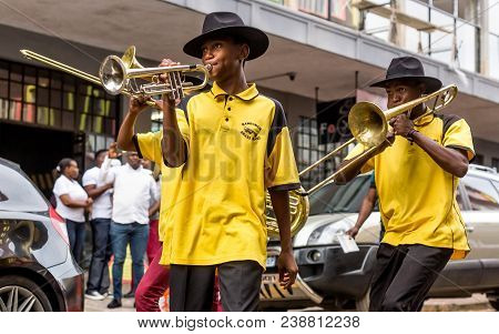 Johannesburg, South Africa, April 29-2018: Buskers Playing On The Streets. Brass Band Performing In 