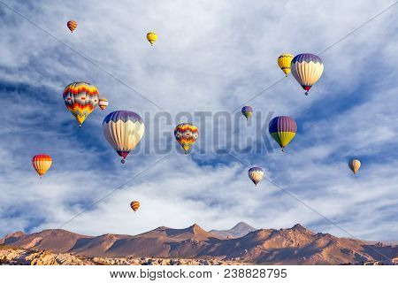 Bright Multi-colored Hot Air Balloons Flying In Sunsrise Sky Cappadocia,